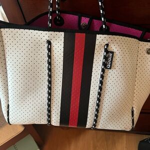 Nice tote with lots of life left!!